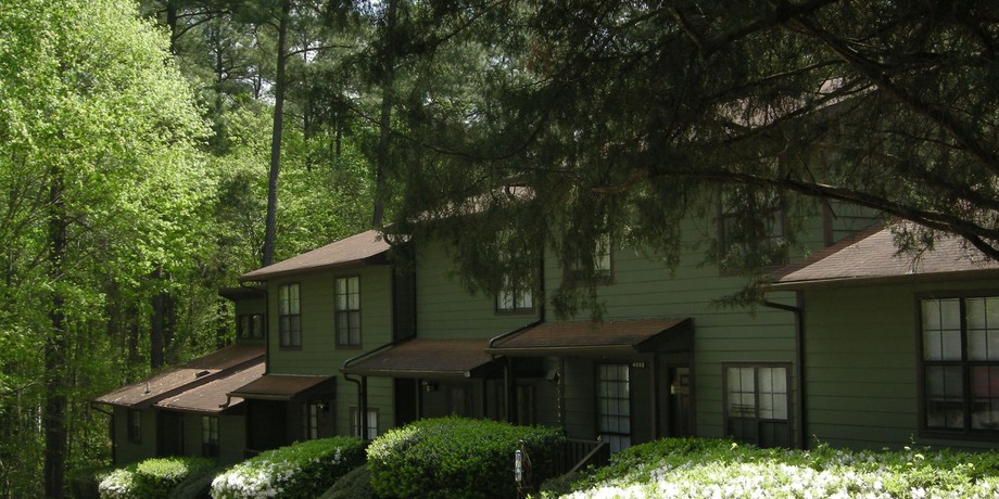 The Oaks of Avent Ferry wooded townhome community with azaleas, Raleigh, North Carolina